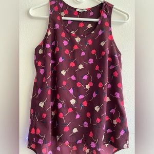 Sleeveless high low top in excellent condition